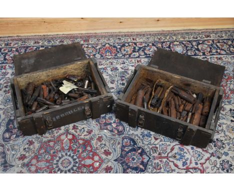 A large collection of threading taps, cased in two ammunition boxes.