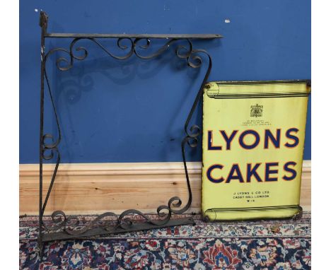 LYONS CAKES; an original advertising double sided enamel sign, approx 55 x 37cm, within wrought iron frame, overall 84 x 56cm