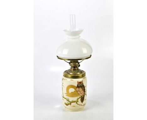 A ceramic vase shaped oil lamp featuring a gold owl, with a drop-in vessel, brass burner gallery and shade ring, height 54cm.