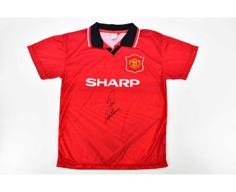 ERIC CANTONA; a signed Manchester United 1994/96 retro style shirt, signed to the front, size M.Condition Report: Light creas