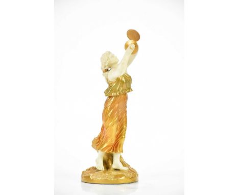 ROYAL WORCESTER; a blush ivory female figure with cymbals, height 28cm.Condition Report: Flea bite to one symbol, restoration