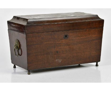 A Victorian mahogany tea caddy of rectangular form with three compartments and applied lion mask head loop handles, length 33