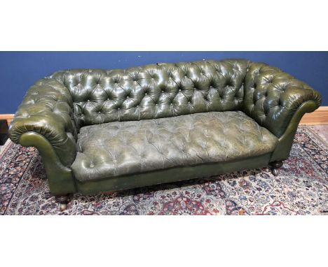 A Victorian green leather Chesterfield sofa, width 203cm, depth 76cm.Condition Report: Height from the floor to the seat 42cm