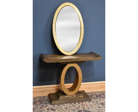 A decorative limed effect console table with gilt oval support, width 106cm, depth 40cm, height 88cm, and modern gilt framed 