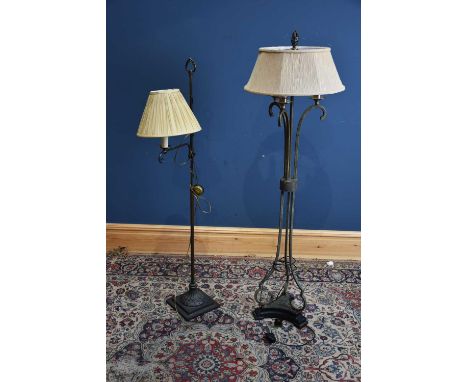 A modern and decorative three branch standard lamp on triangular plinth base, height 146cm, together with a further modern st