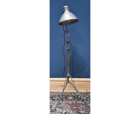 A mid 20th century tripod adjusting lamp, height 126cm.