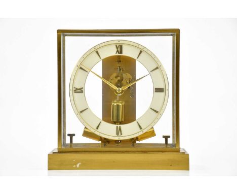 JUNGHANS; a brass cased 'ATO' clock, the dial set with Roman numerals and batons, in glazed case, height 21cm,