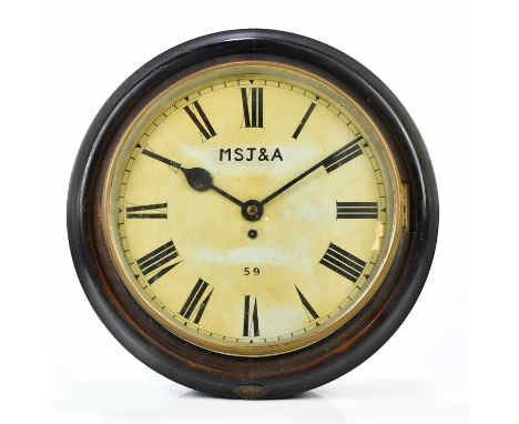 RAILWAY CLOCK; a single fusee wall clock, with a brass label stamped 'L.M.S 17424', and the dial marked for Manchester South 