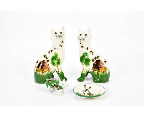 G HILL POTTERY; a pair of seated cats, model of a pig and a pin dish in the style of Wemyss (4).Condition Report: Good condit
