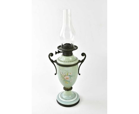A Victorian painted opaque glass oil lamp, with metal scrolling handles and Wright &amp; Butler duplex wick turners, height i