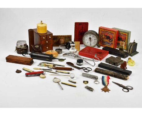 A quantity of collectors' items to include a boxed draughts set, lighters, a miniature chest, a cut throat razor, a compass, 