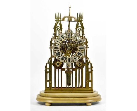 A large and impressive Victorian brass skeleton clock of architectural form with twin fusee movement striking on bell and app