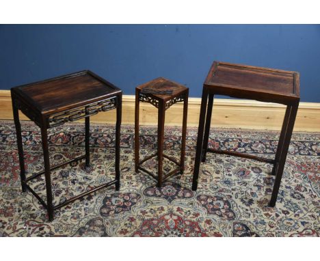 Two Chinese rosewood side tables and similar smaller vase stand, largest approx height 66cm, width 33cm, depth 46cm (3).Condi