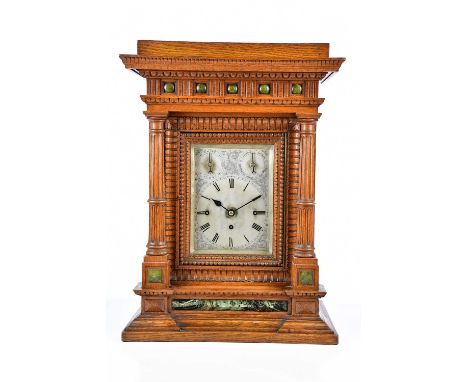 J C JENNENS, LONDON; a 19th century carved oak bracket clock, the silvered dial set with Roman numerals and subsidary dials, 
