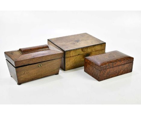 An amboyna cigarette box, enclosing a miscellany of coins, length 24cm, with a Victorian walnut writing slope and a rosewood 