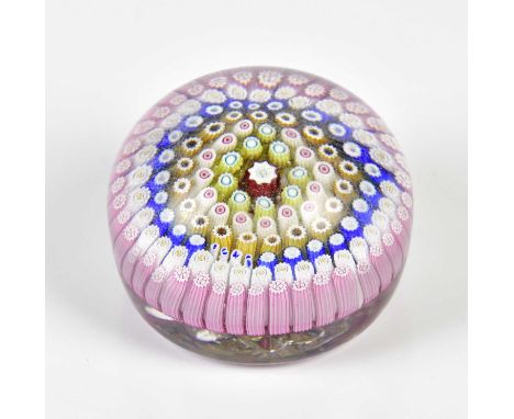 A 19th century millefiori paperweight dated 1848 to four canes, diameter 7cm.Condition Report: Light scratches to the dome an