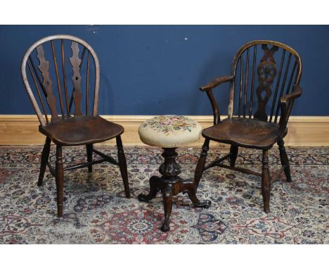 A Victorian carved rosewood piano stool with tapestry top and two elm seated Windsor type chairs including an elbow example (