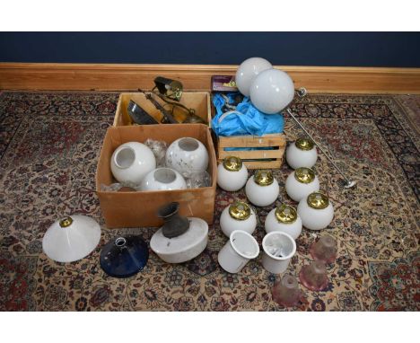 A large collection of lighting to include lamps, wall lights, brackets, shades, etc.