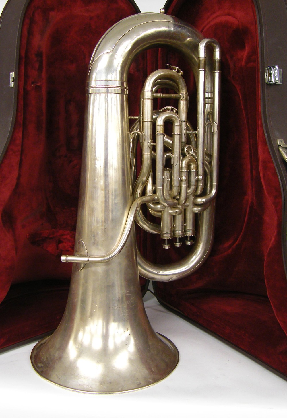Besson 'New Standard' model EEb four valve tuba, within a Besson