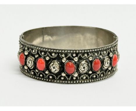 An ornate Italian silver bangle. Stamped Alp, Italy. 6.5x6cm 