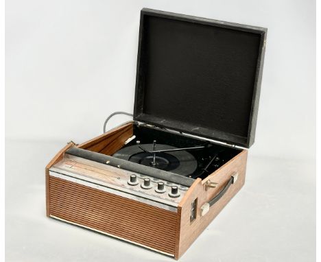 A vintage talk record player by Corvette. RP.230 784661. 