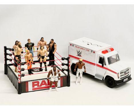Mattel 2020 WWE collection. A Raw WWE wrestling ring with 9 figures and a WWE ambulance. Ring measures 34x34x19.5cm. Ambulanc
