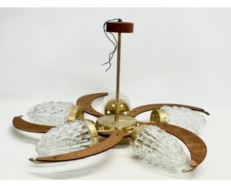 A large 1960’s Mid Century teak and brass ceiling light fitting with 5 glass shades. 69x38cm 