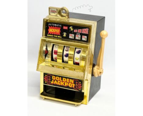 A Waco jackpot slot machine. 27cm 