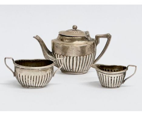 A late 19th century miniature silver tea service. Circa 1898. 18.62 grams. Cornelius Desormeaux Saunders &amp; James Francis 