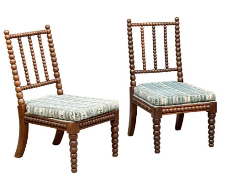 A pair of Victorian mahogany Bobbin Turn nursing chairs. 