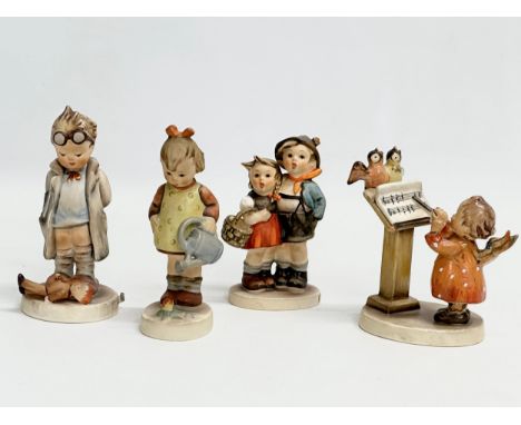 4 West German M.J. Hummel Goebel pottery figurines. 