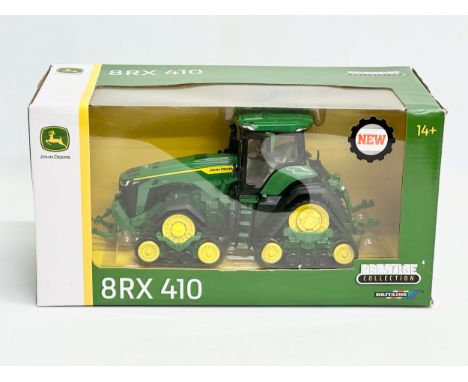A new large Britains Prestige Collection John Deere 8TX410 tractor in box. 30x15x14cm 