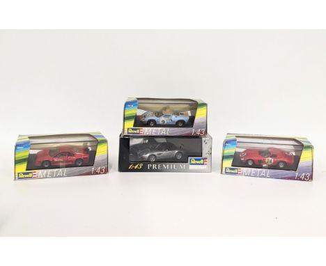 4 model cars by Revell. Ferrari GTO '64 No. 24, Ferrari GTO Evoluzione, Ford GT 40 No. 9 'Le Mans 68,' and BMW Z8 'Titanium S