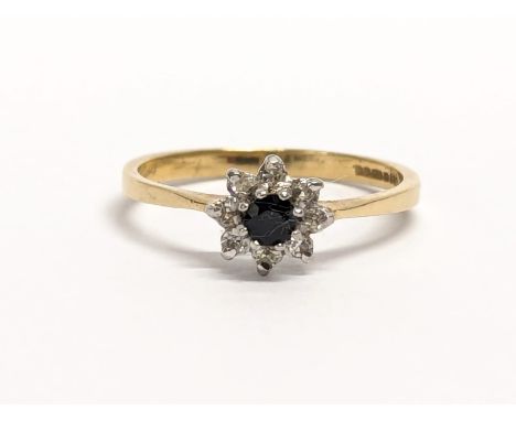 A vintage 9ct gold, diamond and sapphire ring. By LW Birmingham. Size N. 