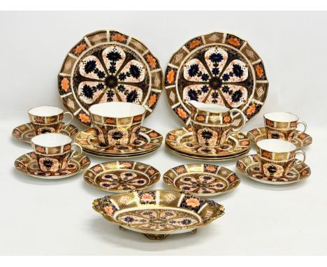 An early 20th century 21 piece Royal Crown Derby Imari tea service. 2 cake plates, 4 cups, 6 saucers, 6 sandwich plates, milk