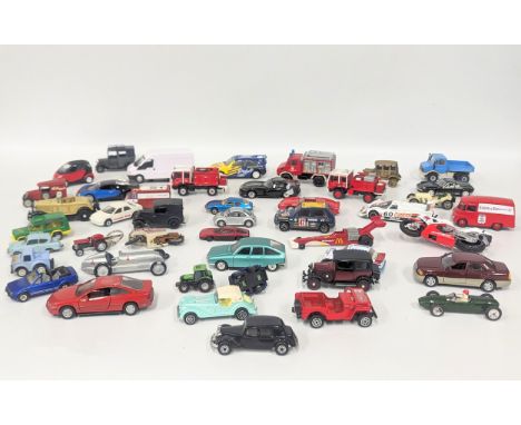 A collection of model cars and trucks including Matchbox, Corgi, Solido, etc 