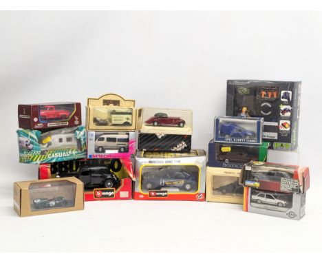 A collection of model cars including Burago, Solido, Days Gone, Eligor, etc. 