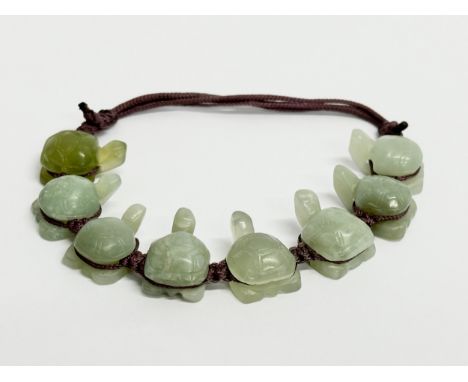 A Chinese Jade bracelet. 10.5x9cm 