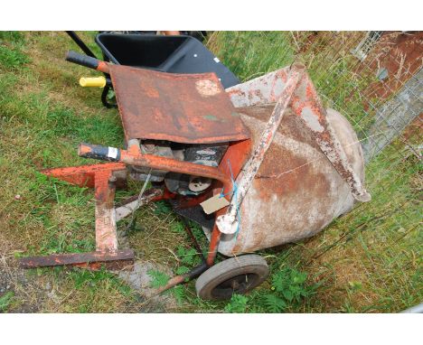 A petrol driven concrete mixer with 3 HP Briggs and Stratton engine 4 stroke, engine turns.