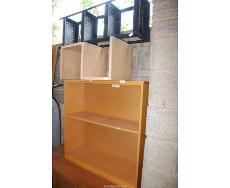 A wooden shelf unit, a plastic four shelf unit, etc.