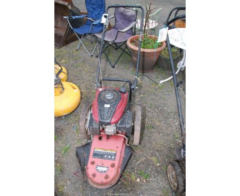 A Tontic" wheel operated Strimmer, overhead four stroke engine, (good compression).