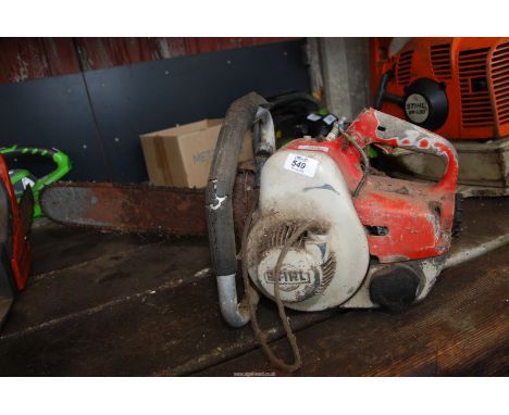 A vintage "Stihl" Chainsaw, no chain brake, engine doesn't turn.