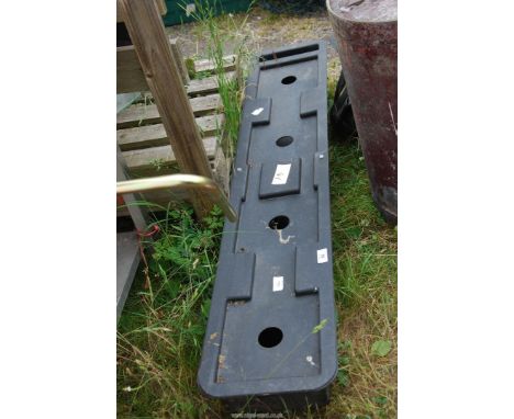A plastic trough, 52'' wide x 10" deep x 9" high.