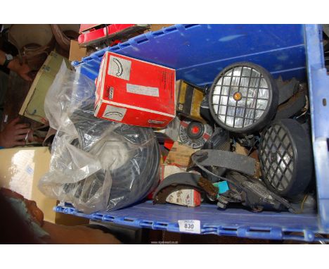 A box of automobile items to include an Air Hose '38', spot lamps, various bearings, lockable fuel cap, brake shoes etc.