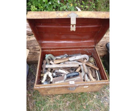 A metal trunk with various tools, etc.