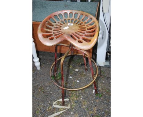 A tractor seat Bar Stool.