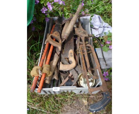 A quantity of tools to include: to include handsaws, etc.