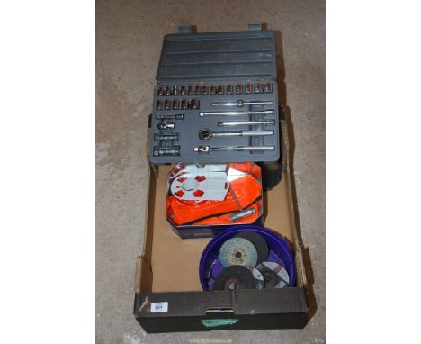 A 3/8'' drive socket set, various tools, 4" grinding and cutting disc.