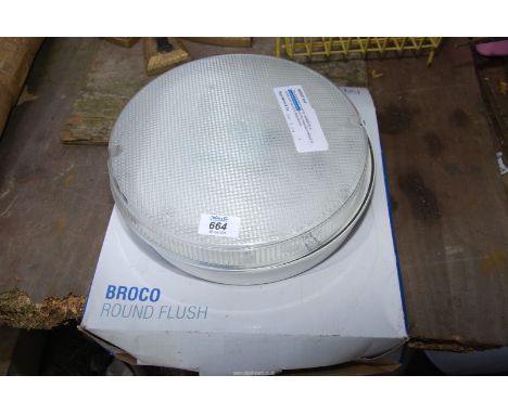 A "Broco" round flush ceiling fixing light unit.