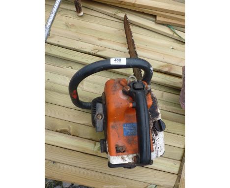 A Chainsaw engine turns.